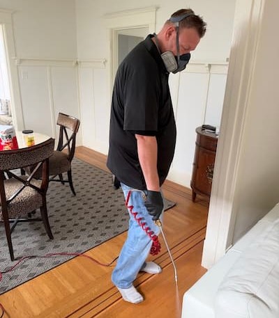 Technician applying Actisol treatment indoors